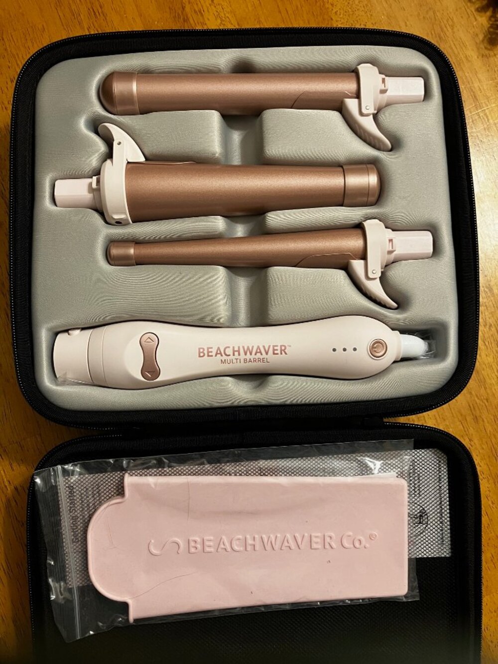 Beachwaver multi barrel curling wand set in pink and rose gold w/storage case.